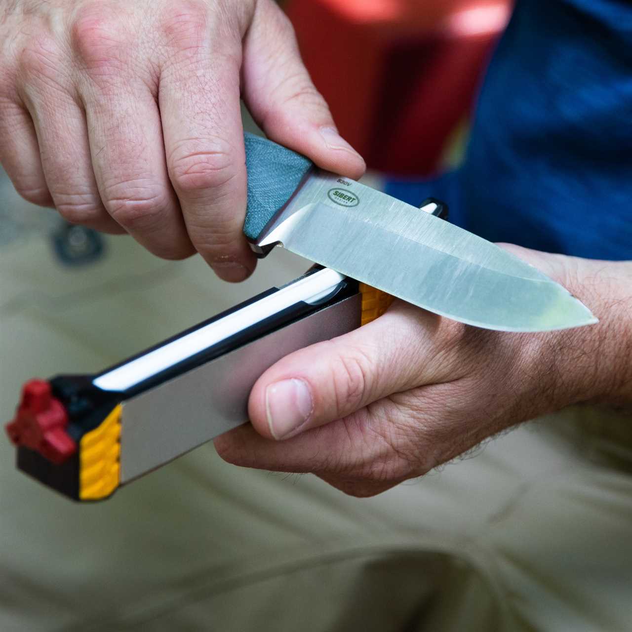 splitting wood with a knife