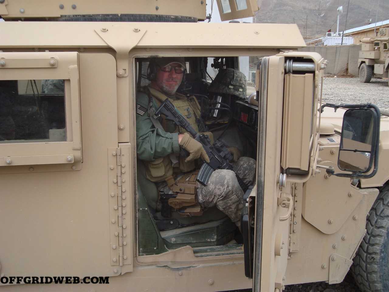 Timothy Lacy Guerrilla Mentor riding in a humvee 2008