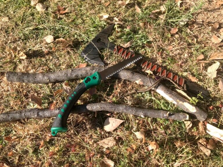 throwing stick cut into shape with hand saw