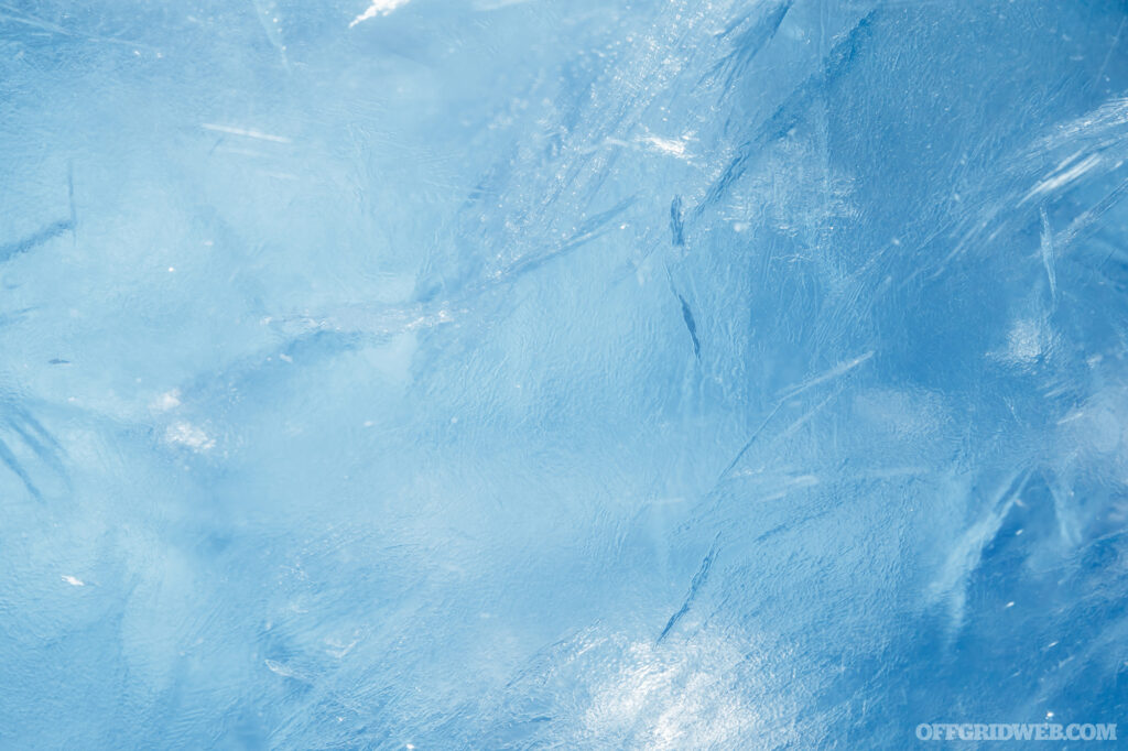 A photo of ice which appears to be blue in color.