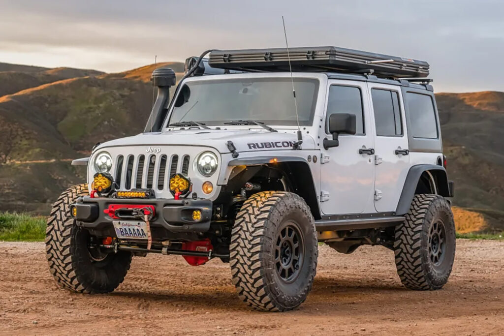Photo of a 2017 Jeep Wrangler modified as an overland rig and listed on the Bring a Trailer digital auction platform.