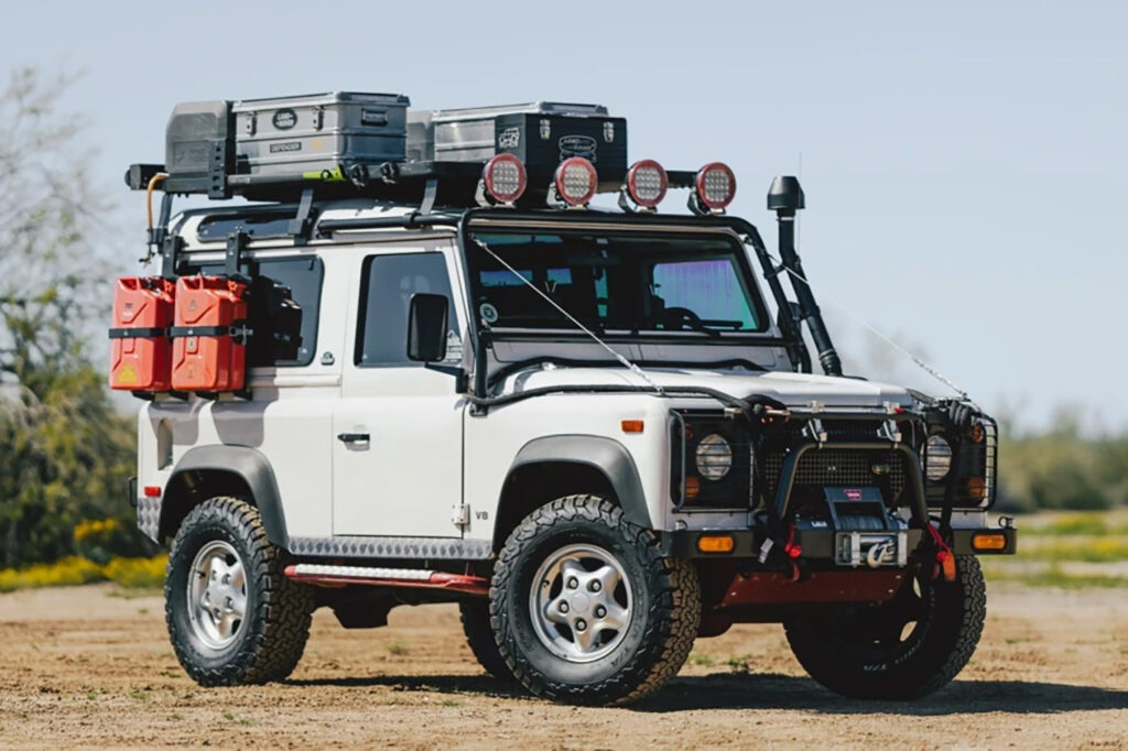 Photo of a 1997 Land Rover outfitted for overlanding, listed on the Bring a Trailer digital auction platform.