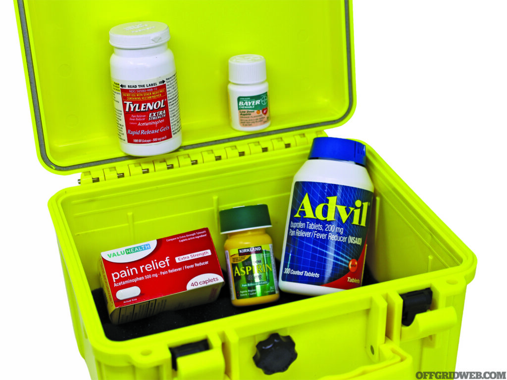 Studio photo of a hard shell case filled with over the counter pain relievers such as Tylenol and Advil.