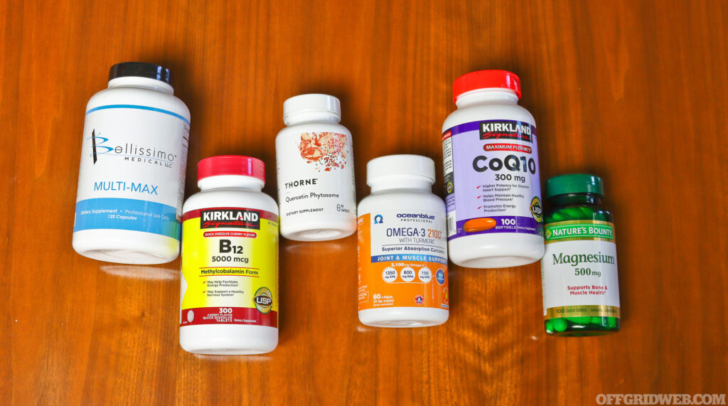 Photo of several nutritional supplements lying side by side on a table as survival medicine suggestions.