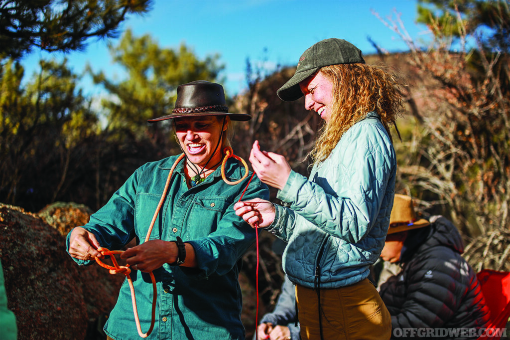 Jessie Krebs teaching a student some rope techniques.