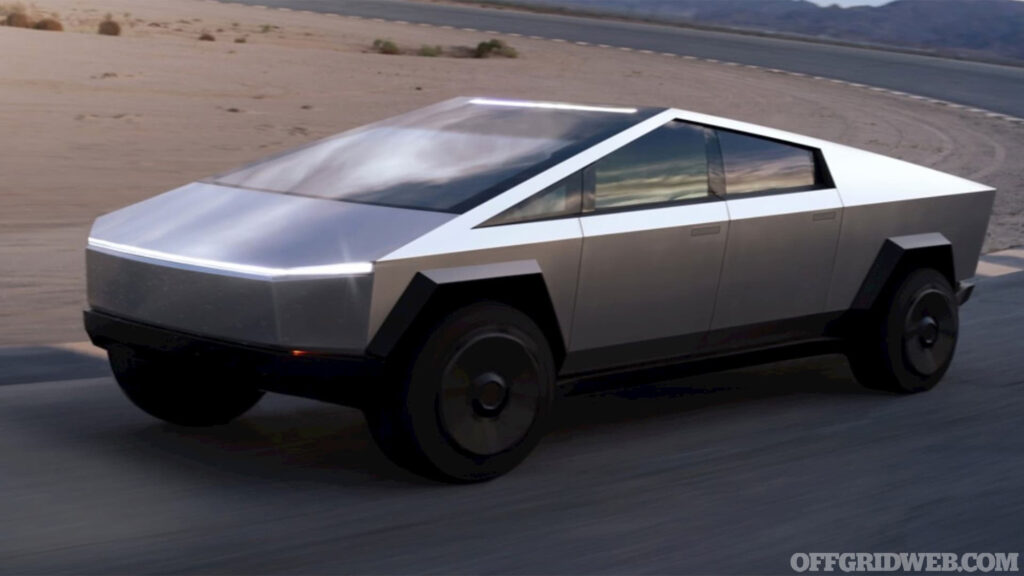 Photo of the Tesla Cybertruck driving on a desert road.