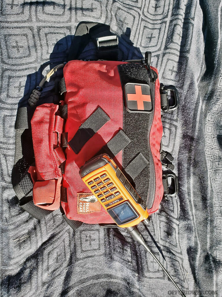 The features and construction of the GS5B make it an excellent choice for use in a public safety role. Mine is a key part of my Search and Rescue kit, living on my Hill People Gear SARv2 chest rig.