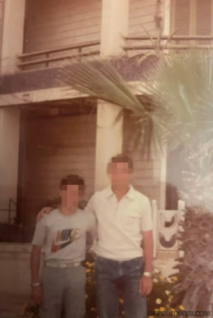 Photo of Adam Gamal as a boy with his father.