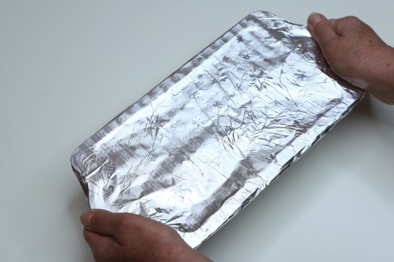 placing aluminum foil