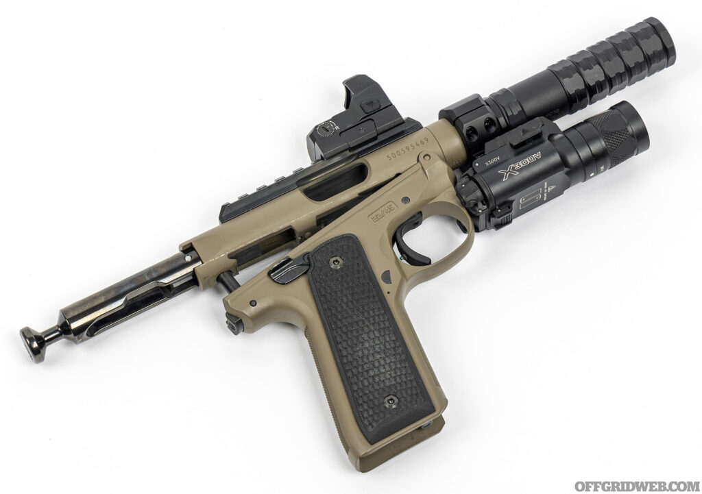 Photo of the Ruger Mark IV with a JK Armament modular suppressor.