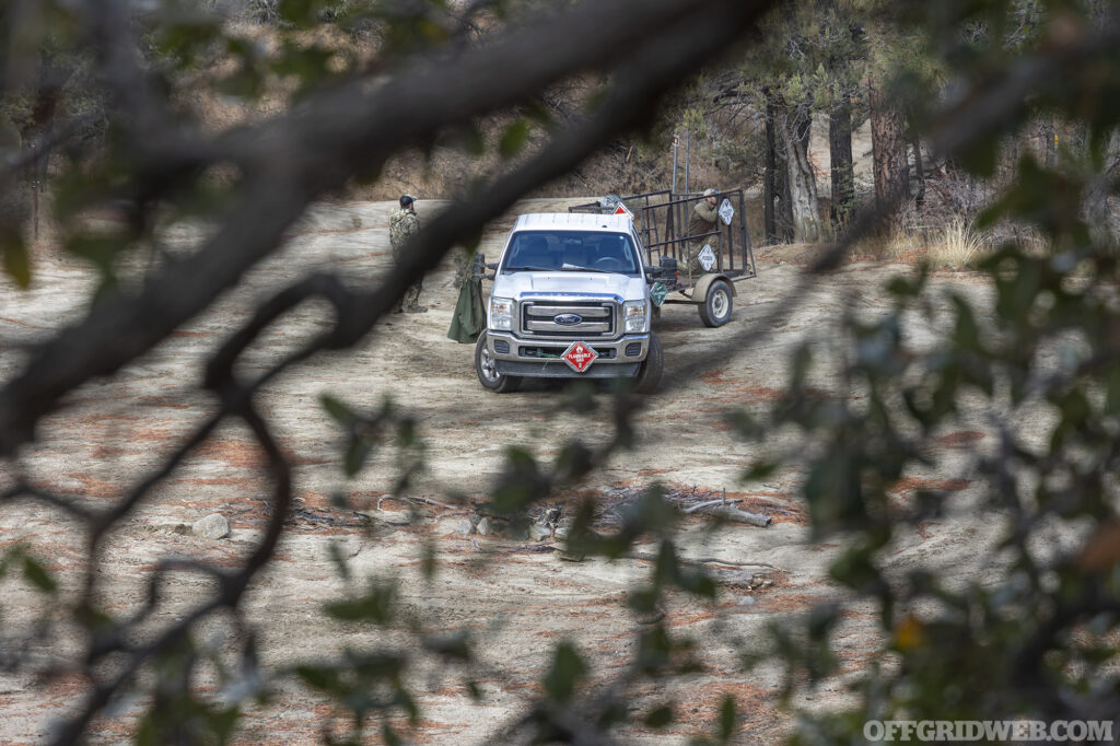 Target truck as seen through tree branches.