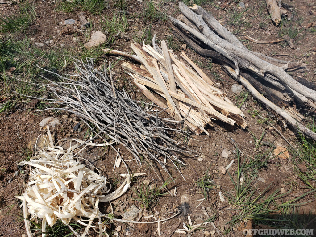 Three small piles of fire building materials.