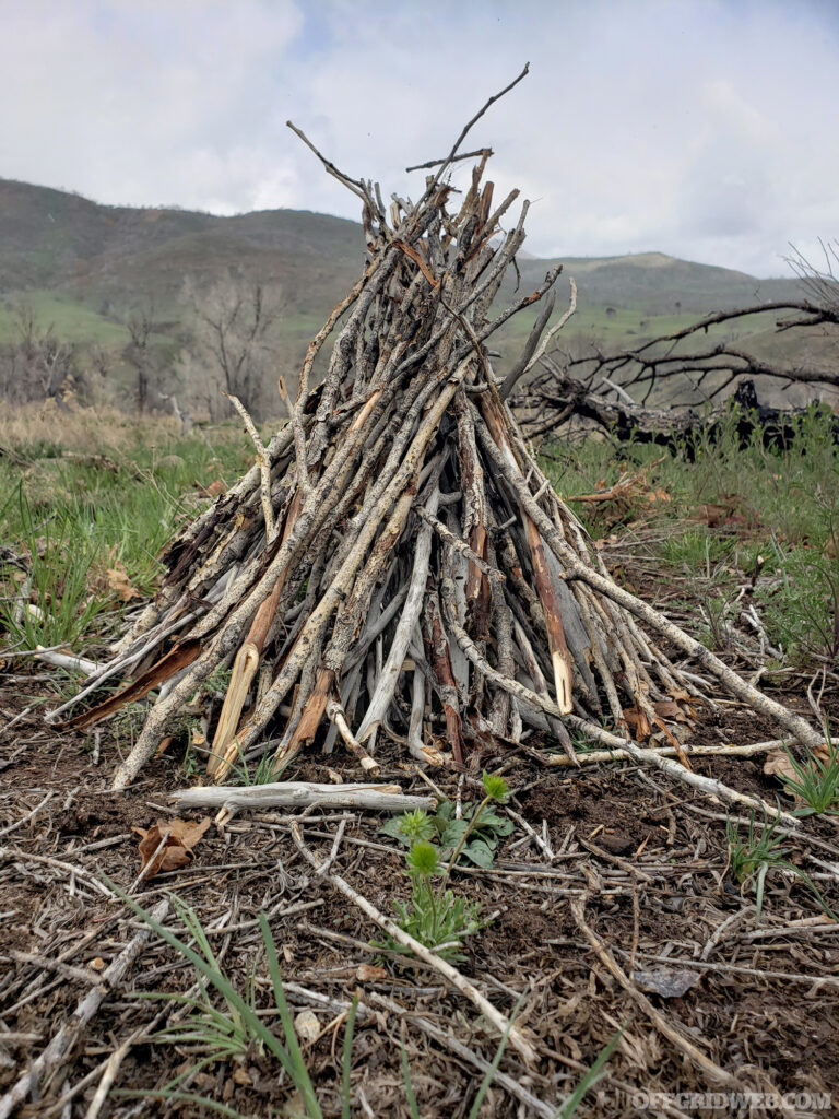 Photo of firewood stacked into a pile.