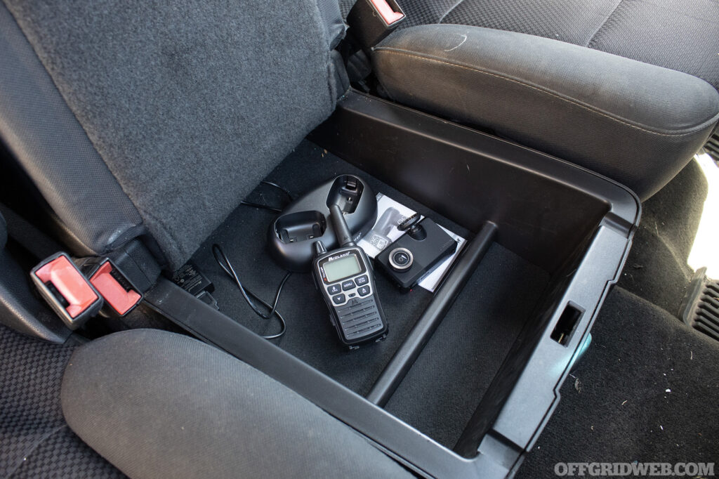 Photo of the storage space under the front bench seat of a pickup truck.