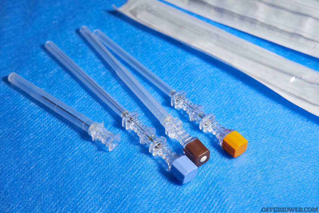 Once inserted, remove the metal decompression needle and leave the plastic catheter.