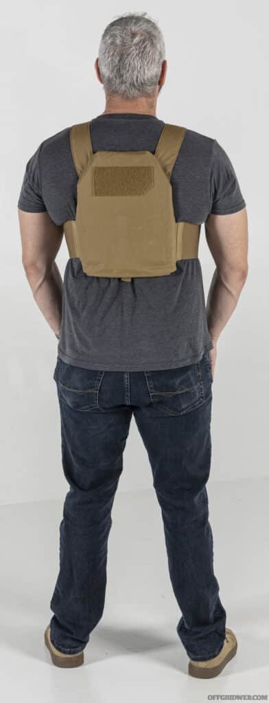 Rear view of a man wearing the Haley Strategic concealable plate carrier.