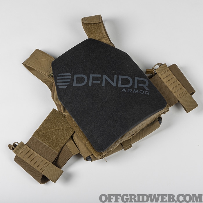 A DFNDR plate lying on top of a Haley Strategic concealable plate carrier.