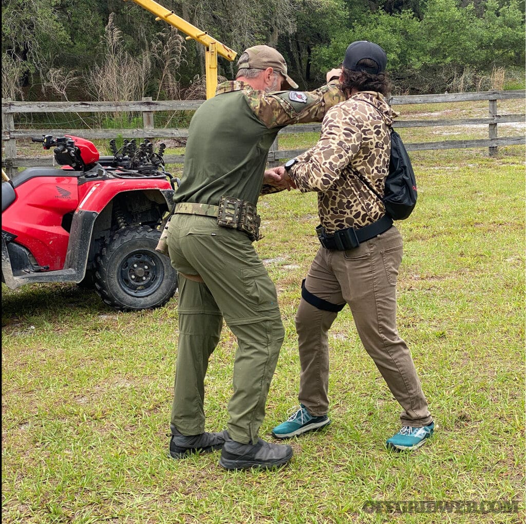 image of men practicing hand to hand combat at the fill spectrum warrior course