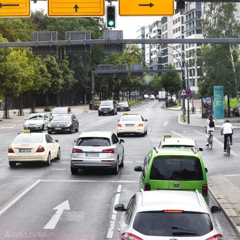 cars on the road inside city