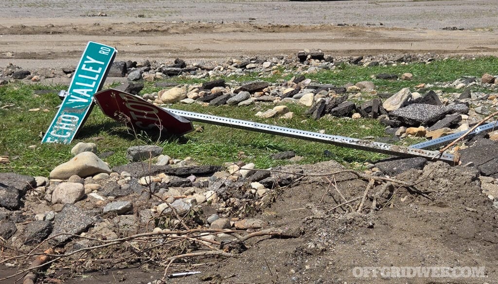 Image of a downed street sign after a flood