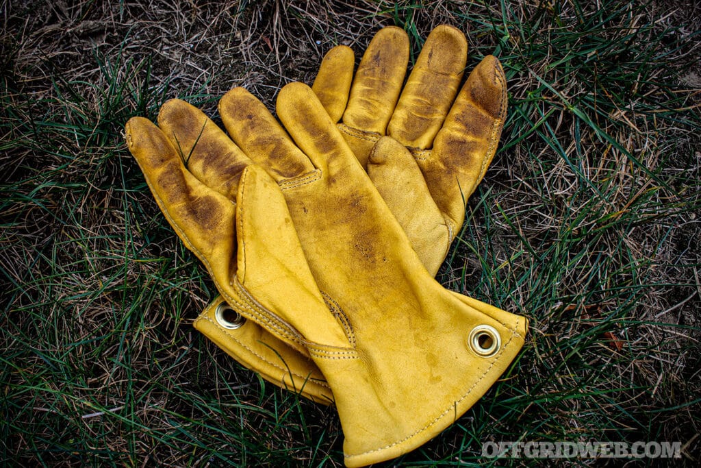 image of well used Badger Claw Outfitter leather gloves