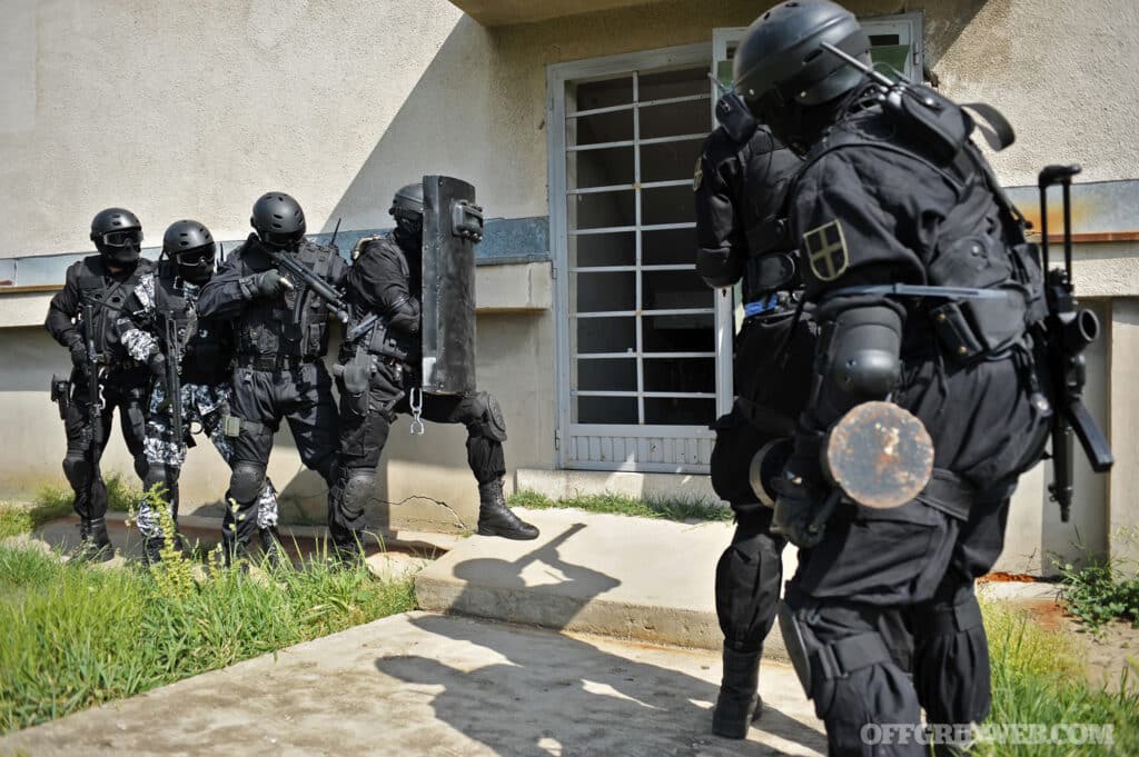 image of police in front of a house