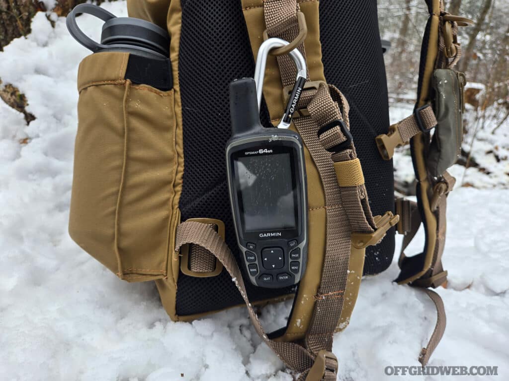 A Garmin 64ST attached to the Discovery M1 go bag