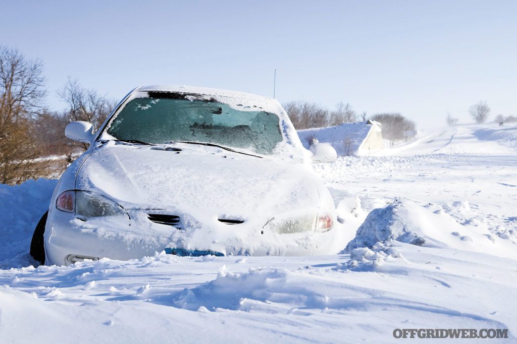 image of a car buried in snow