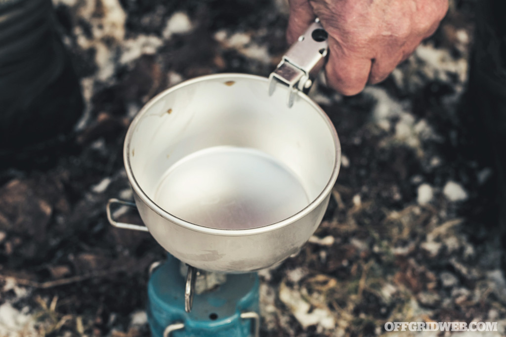 a cook pot and propane stove