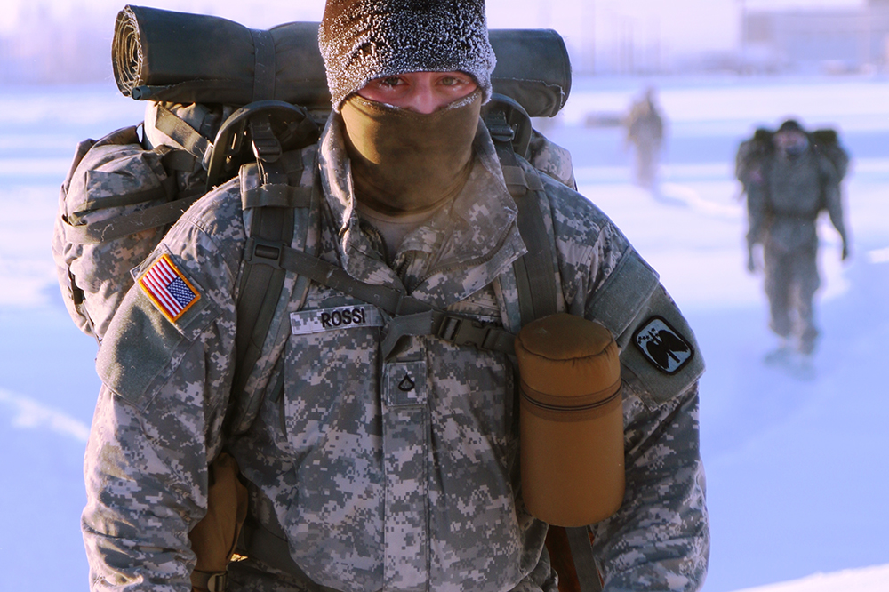 military service member in snow gear