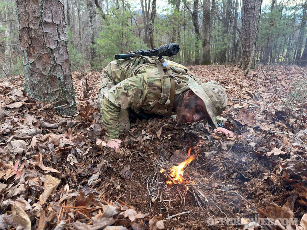 practicing SERE in the woods