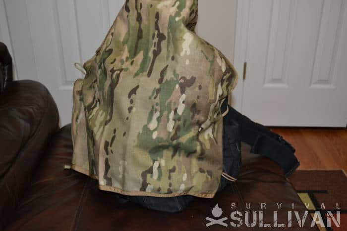 camo tarp over backpack